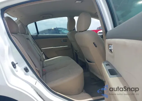 2009 Nissan Sentra 2.0S from USA, damaged, VIN 3N1AB61E99L606850